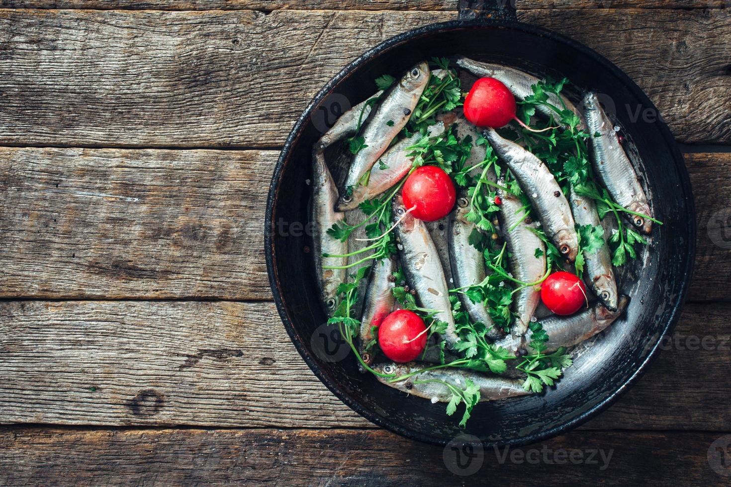 Smelt fish in the pan photo