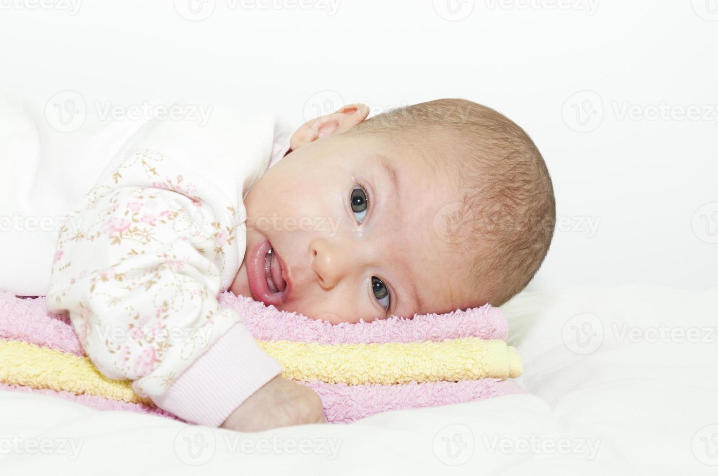 Baby on towels photo