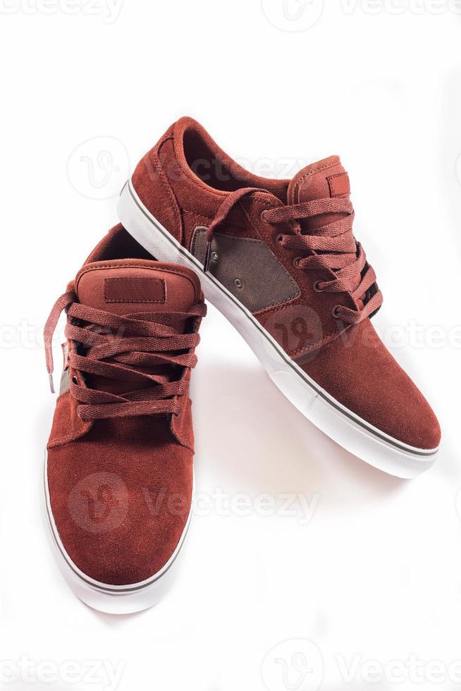 Red sneakers isolated photo