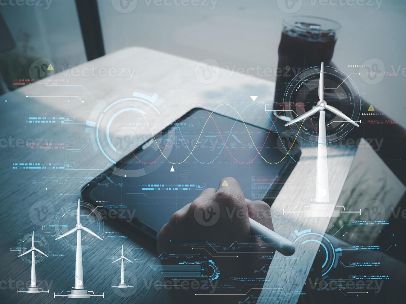 man analyzing Renewable energy or renewable energy supplying energy with wind turbines photo