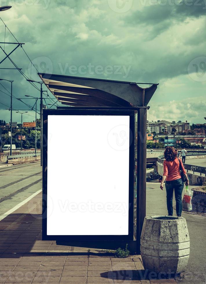 Blank billboard on bus station photo