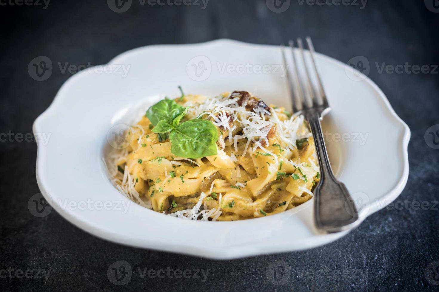 Served pasta carbonara photo