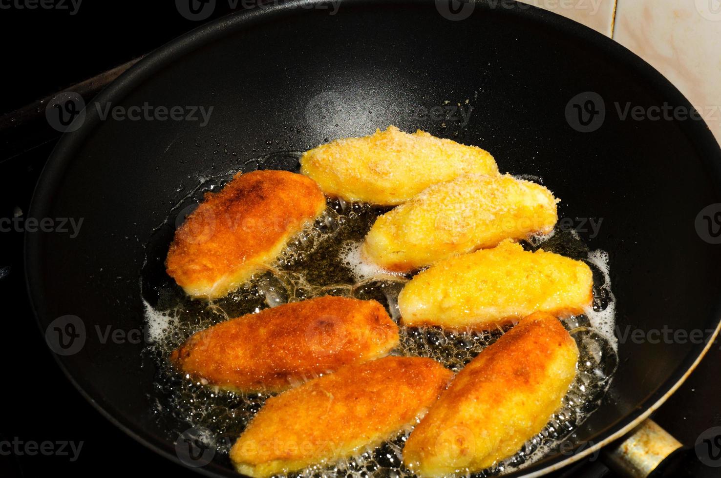 Frying potato sticks photo