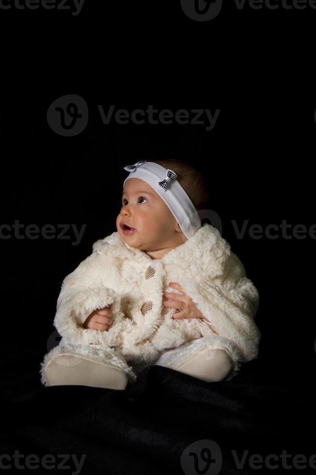 Baby in dark photo