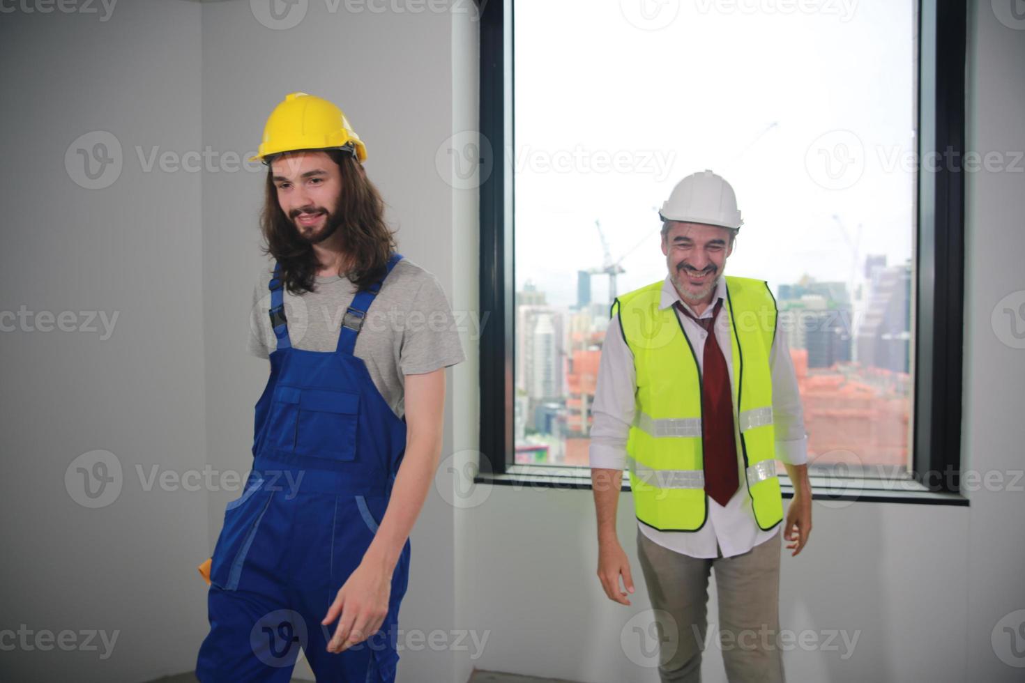 Architect, foreman working at construction or architecture site photo