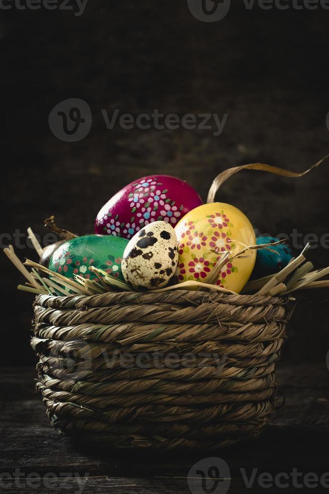 Easter eggs in the basket photo