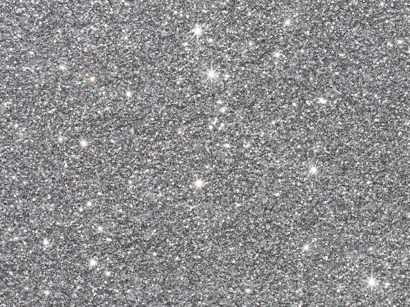 Silver glitter background. Sparkle texture. photo