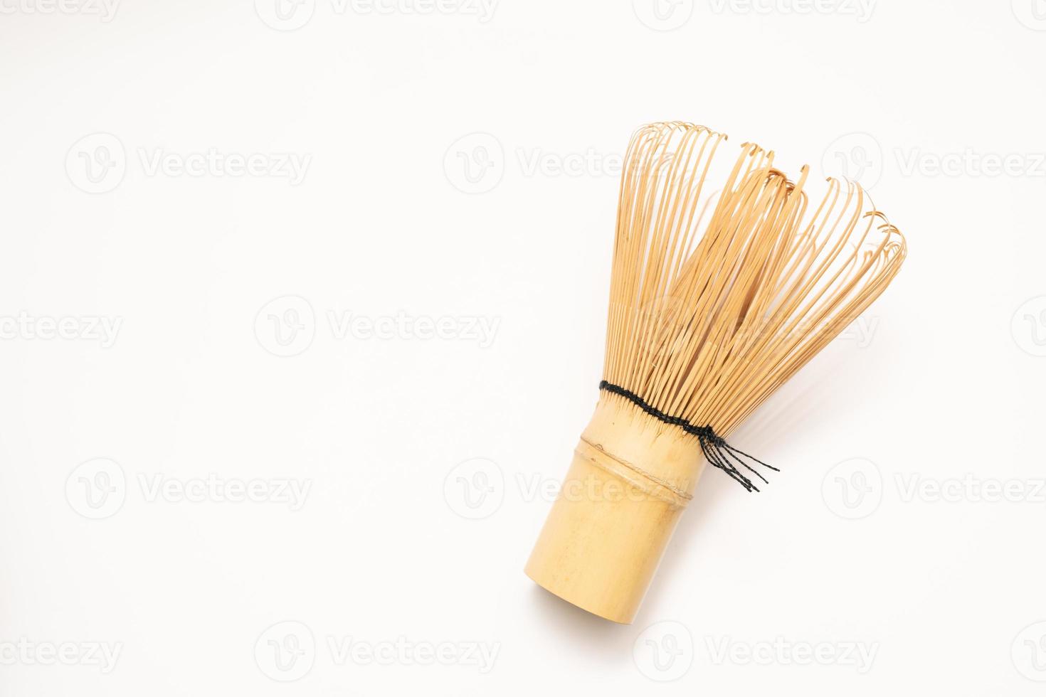 Japanese Bamboo Brush Tea Whisk or Chasen isolated on White Background. Japanese bamboo tea whisk. selective focus. photo