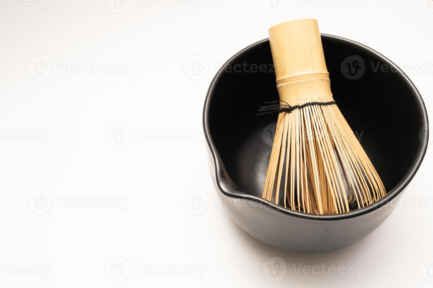 Japanese Bamboo Brush Tea Whisk or Chasen isolated on White Background. Japanese bamboo tea whisk. selective focus. photo