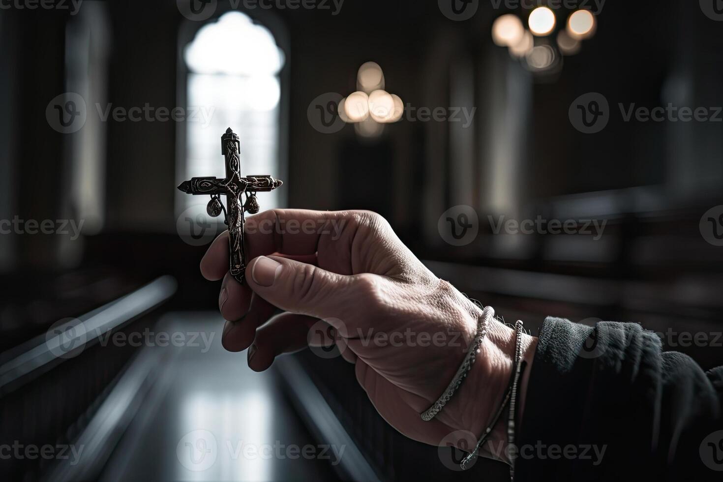 Church priest holds religious cross in hands. photo