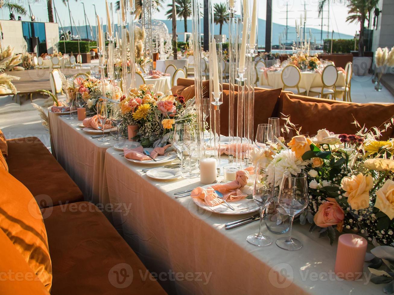 Luxury elegant wedding reception table arrangement and floral centerpiece - wedding banquet and event outdoor photo