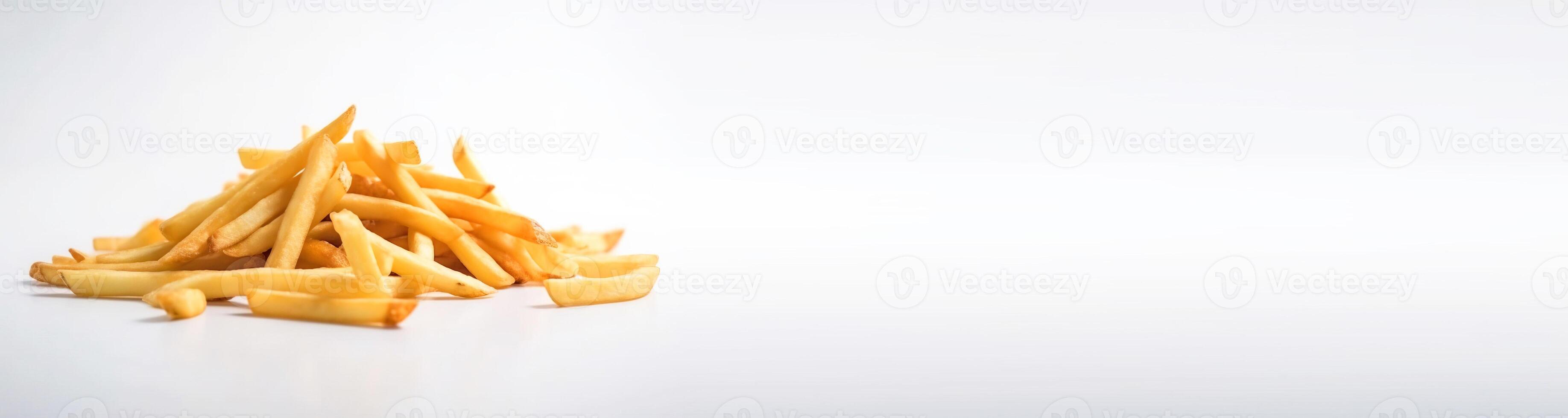 Fried hanging french fries with in a pile on a white background isolate. . Header banner mockup with space. photo