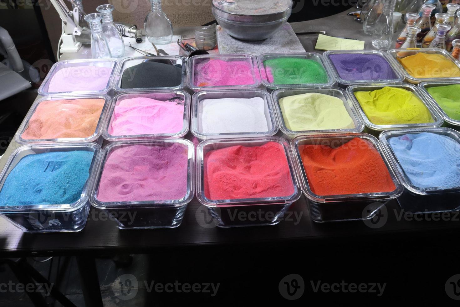 Colourful sand in glass box for artwork photo