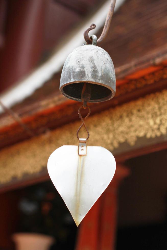 Gold brass Bells Hanging on pagoda in temple, Thailand photo