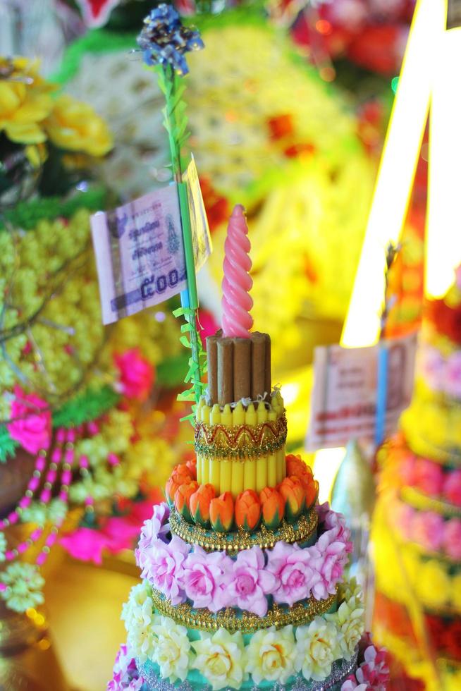 Colorful ribbons and Banknote Decorate on golden tray for Newly ordained Buddhist monk pray with priest procession. photo