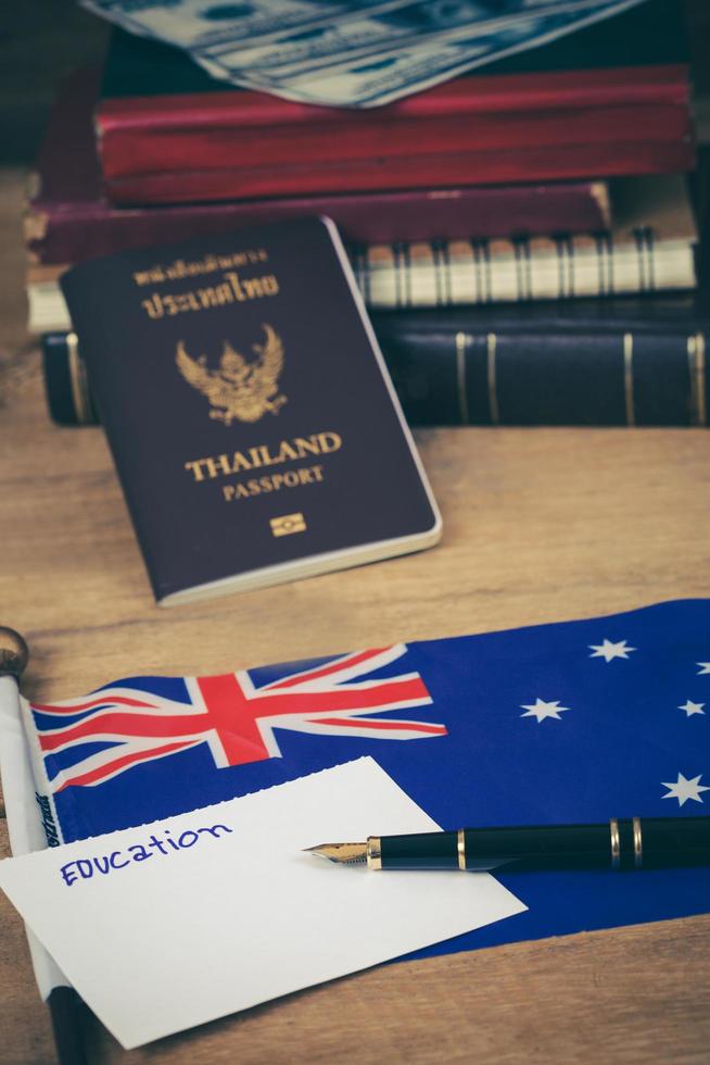 Education in Australia concept,passport and white note on Australia flag . photo