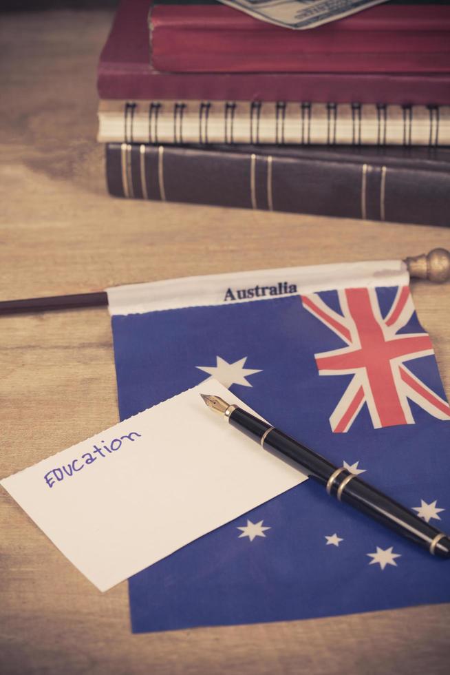 Education in Australia concept,passport and white note on Australia flag . photo