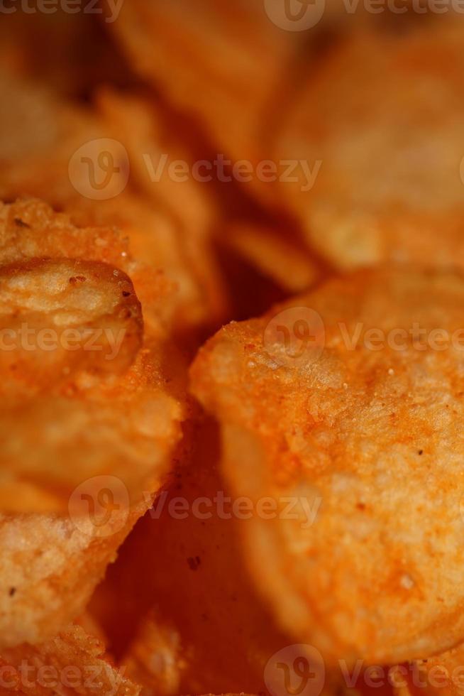 Top view of potato chips with paprika spice fast food concept eating junk food background high quality big size instant prints stock photography photo