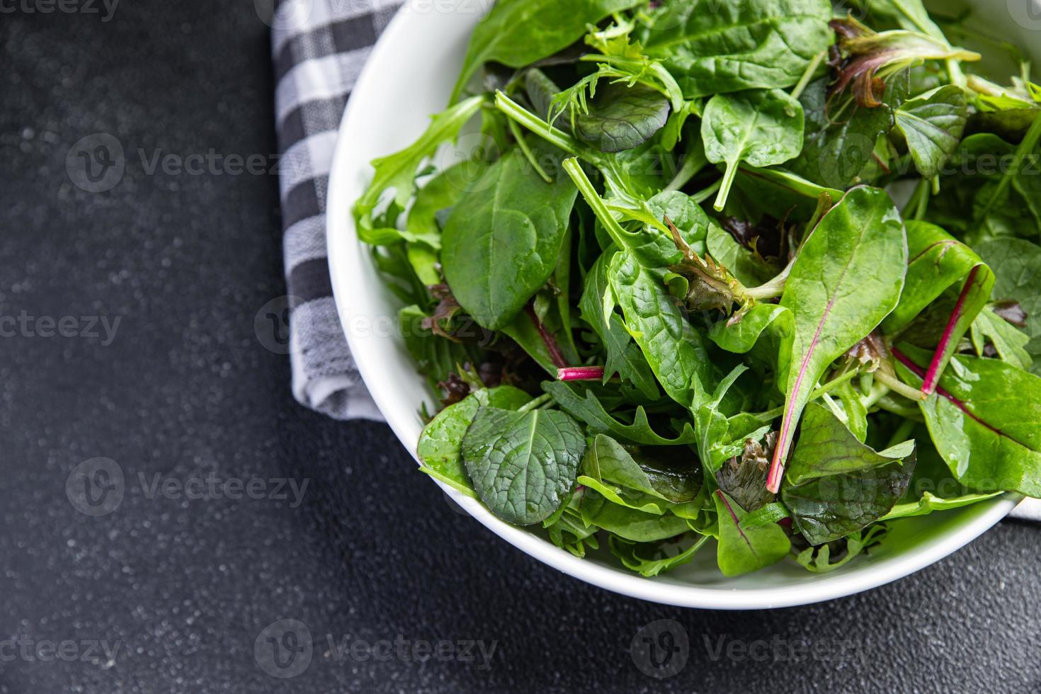 green salad leaves fresh mix healthy snack food on the table copy space food background rustic top view photo