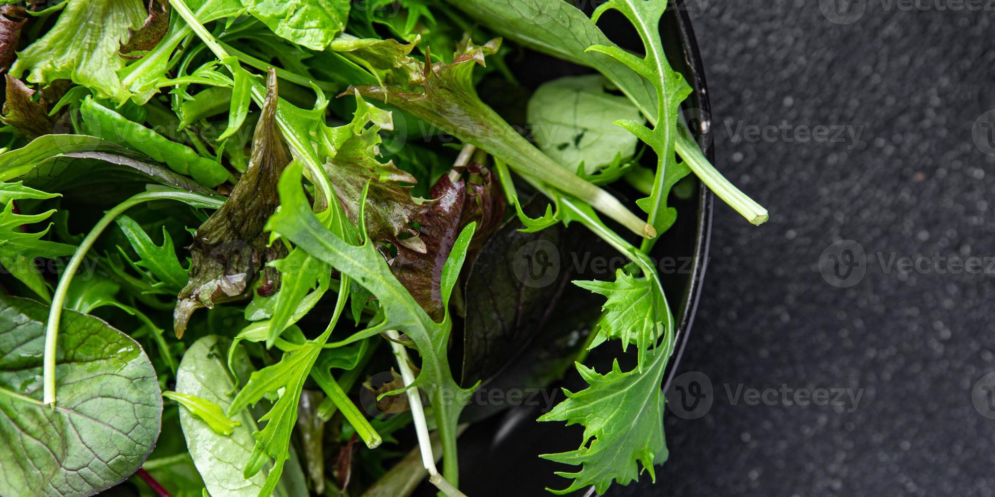 green salad leaves fresh mix healthy snack food on the table copy space food background rustic top view photo