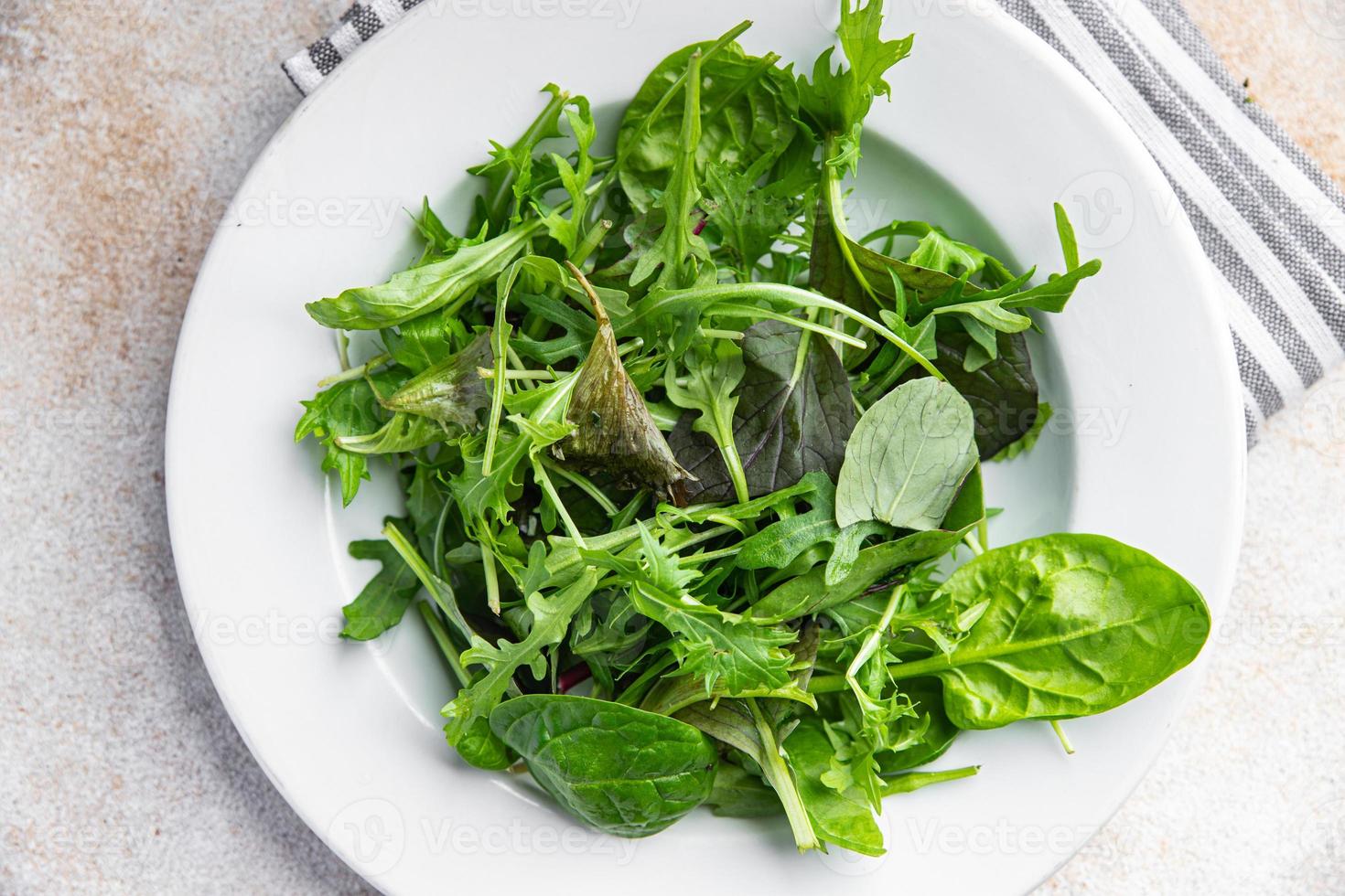 green salad leaves fresh mix healthy snack food on the table copy space food background rustic top view photo
