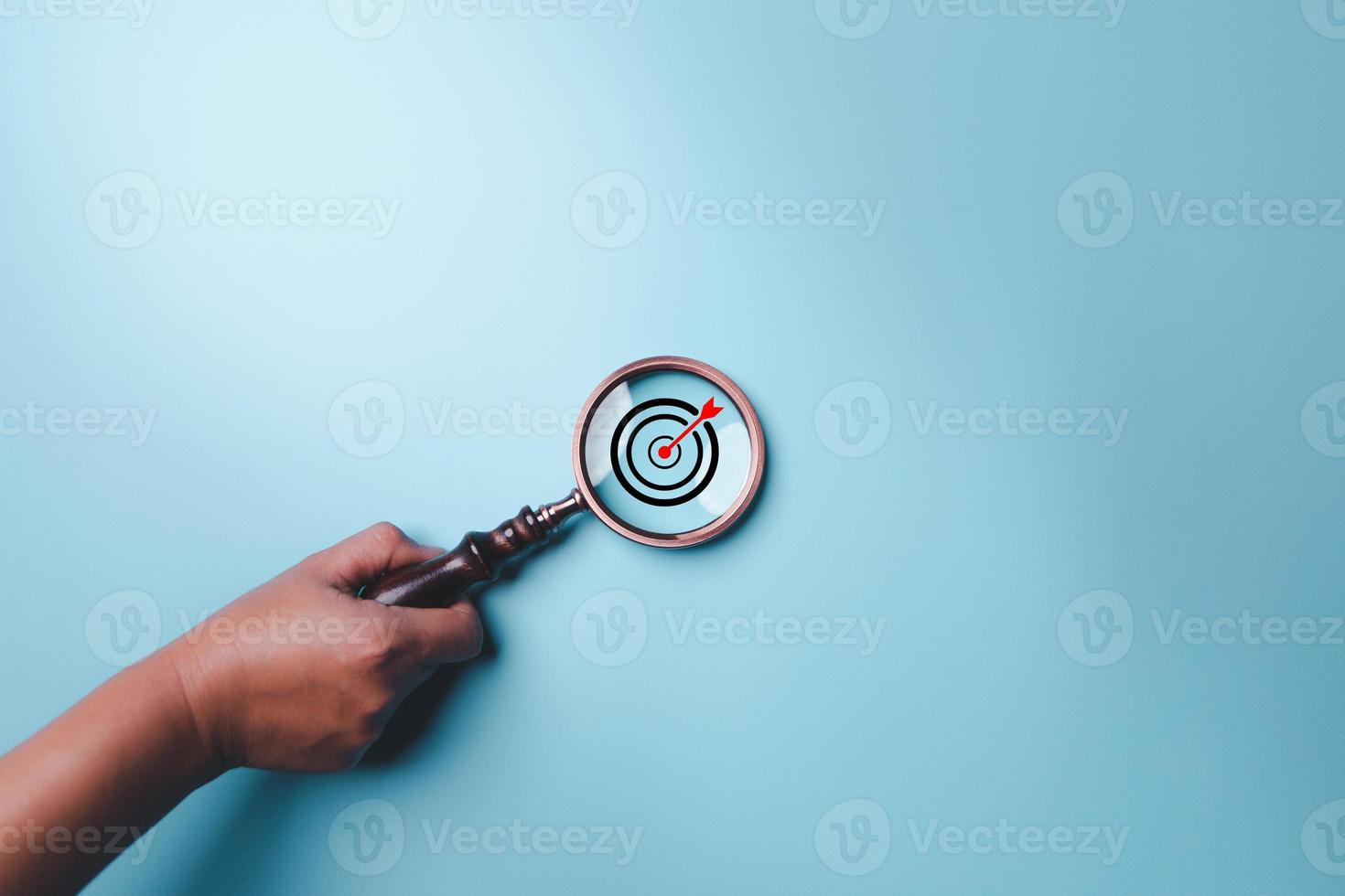 Target Board Inside Of Magnifier Glass For Focus Business Objective On Blue  Background And Copy Space Stock Photo - Download Image Now - iStock