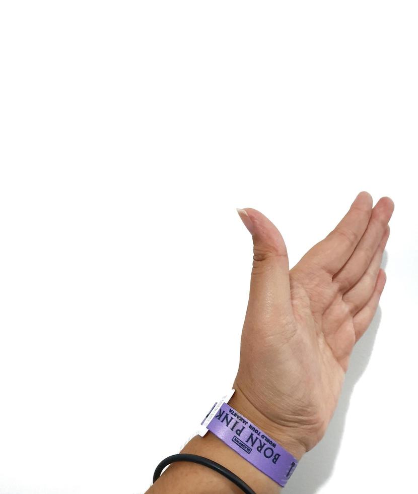 Jakarta, Indonesia on March 2023. Isolated photo of a hand with wristband blackpink concert