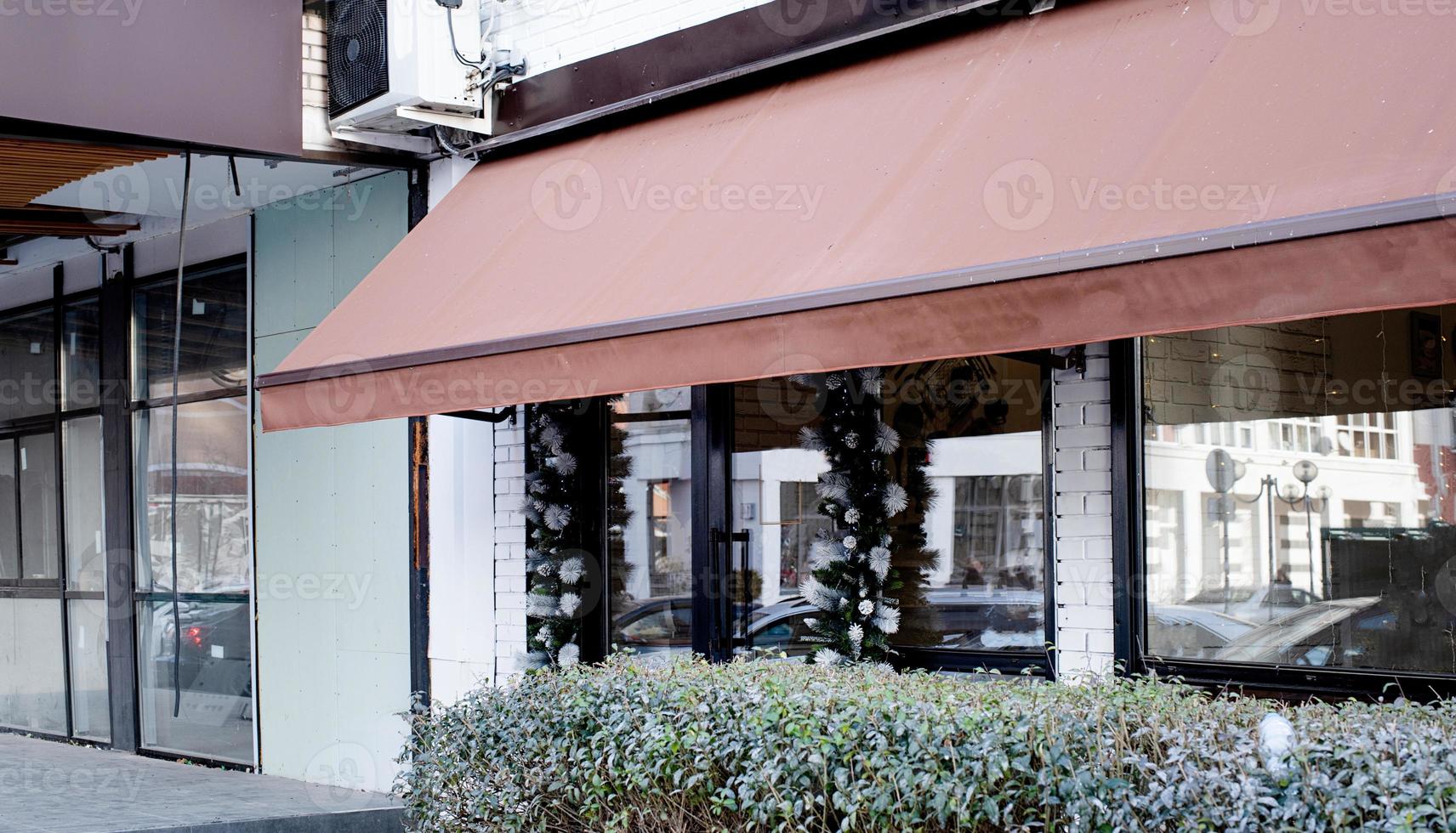 Cafe exterior with large windows, mockup design photo