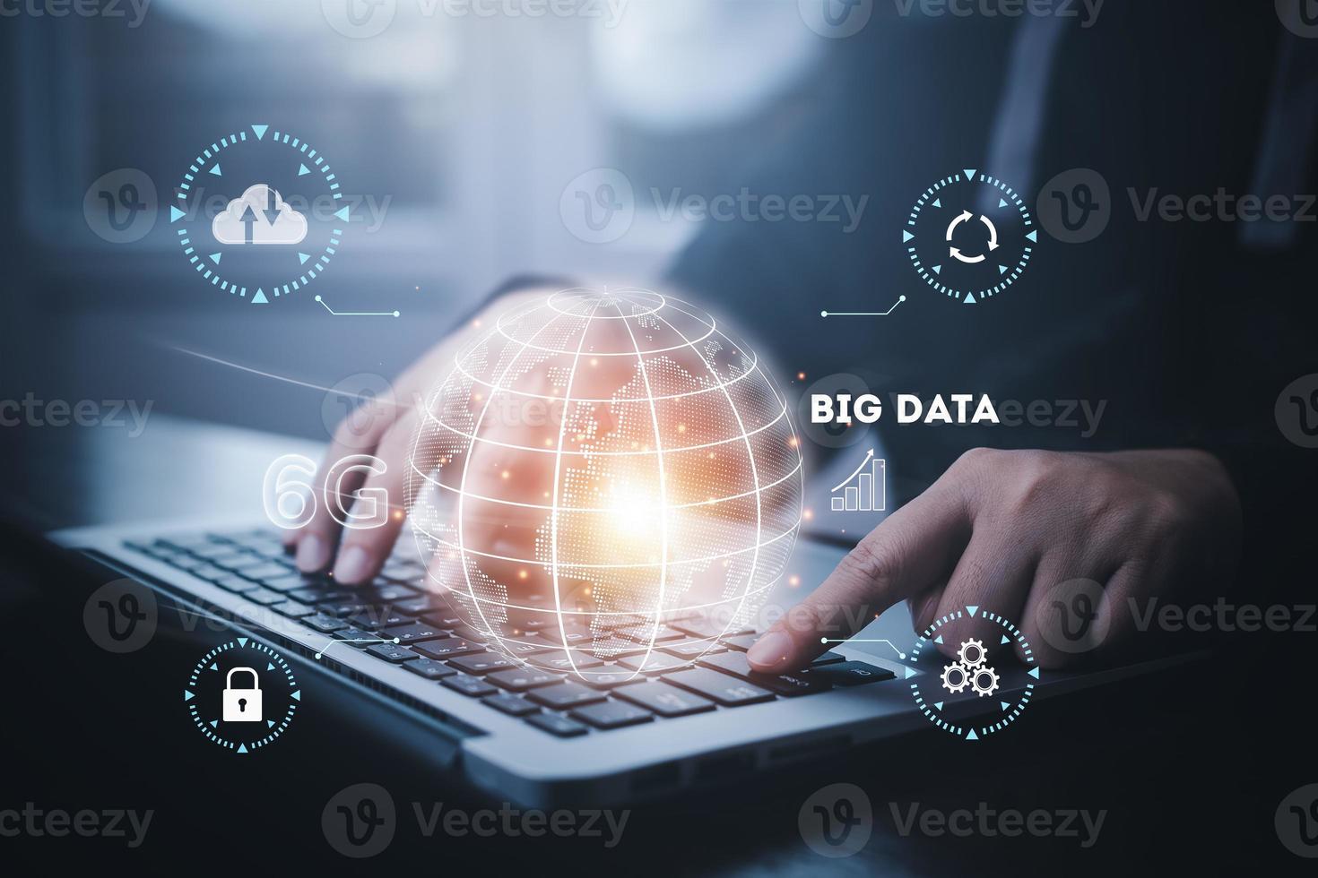Big data concept, Businesspeople use laptops and press the big data symbol, Data Management System on the computer, Corporate strategy for finance and technology Software development, IoT concept. photo