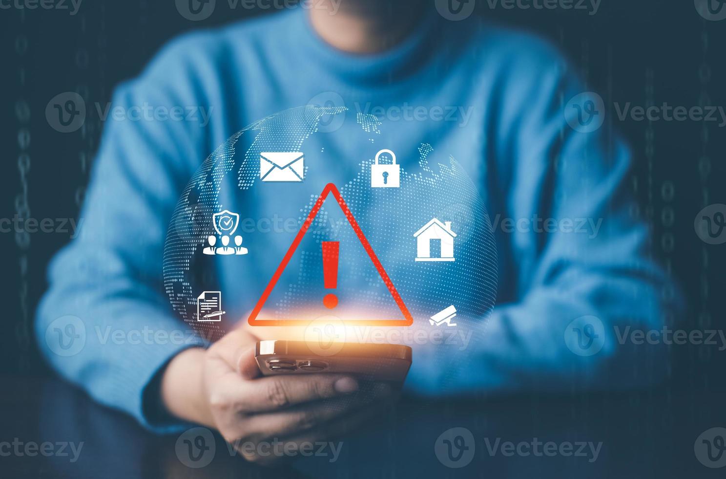 Man using smartphone with triangle caution warning sign for notification error, Programmer using laptop with triangle caution warning sign, hacker attacks and hacking data, cyber crime, cyber security photo