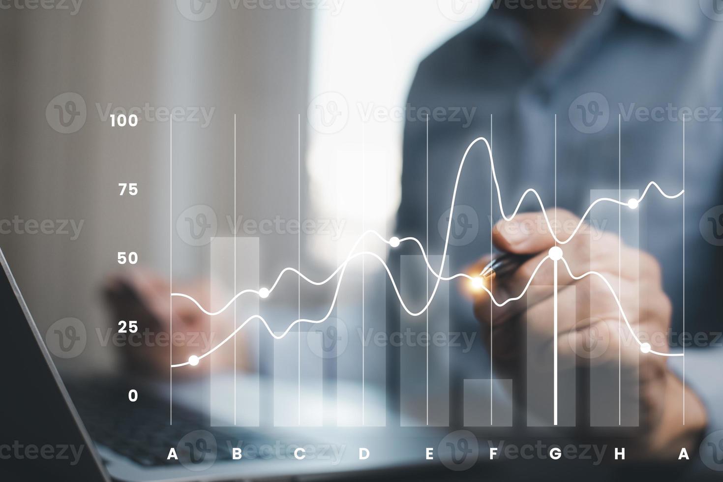 Business analytics and financial concept, Plans to increase business growth and an increase, Technology and Business trend analysis concepts, with business graphs coming out on the computer notebook. photo