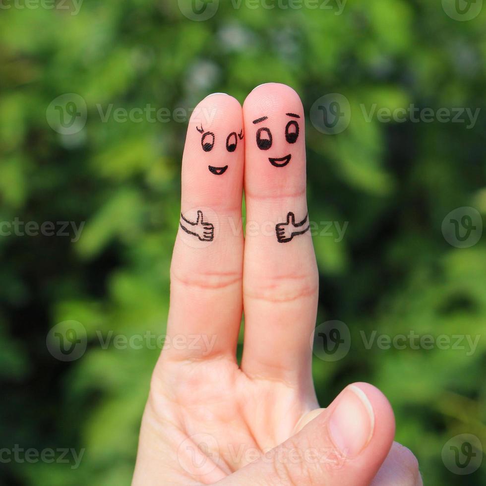 Finger art of Happy couple showing thumbs up photo