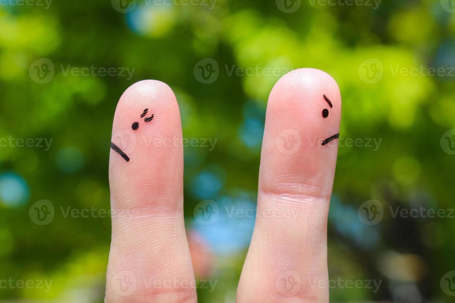 Finger art of couple. Couple after an argument looking in different directions. photo