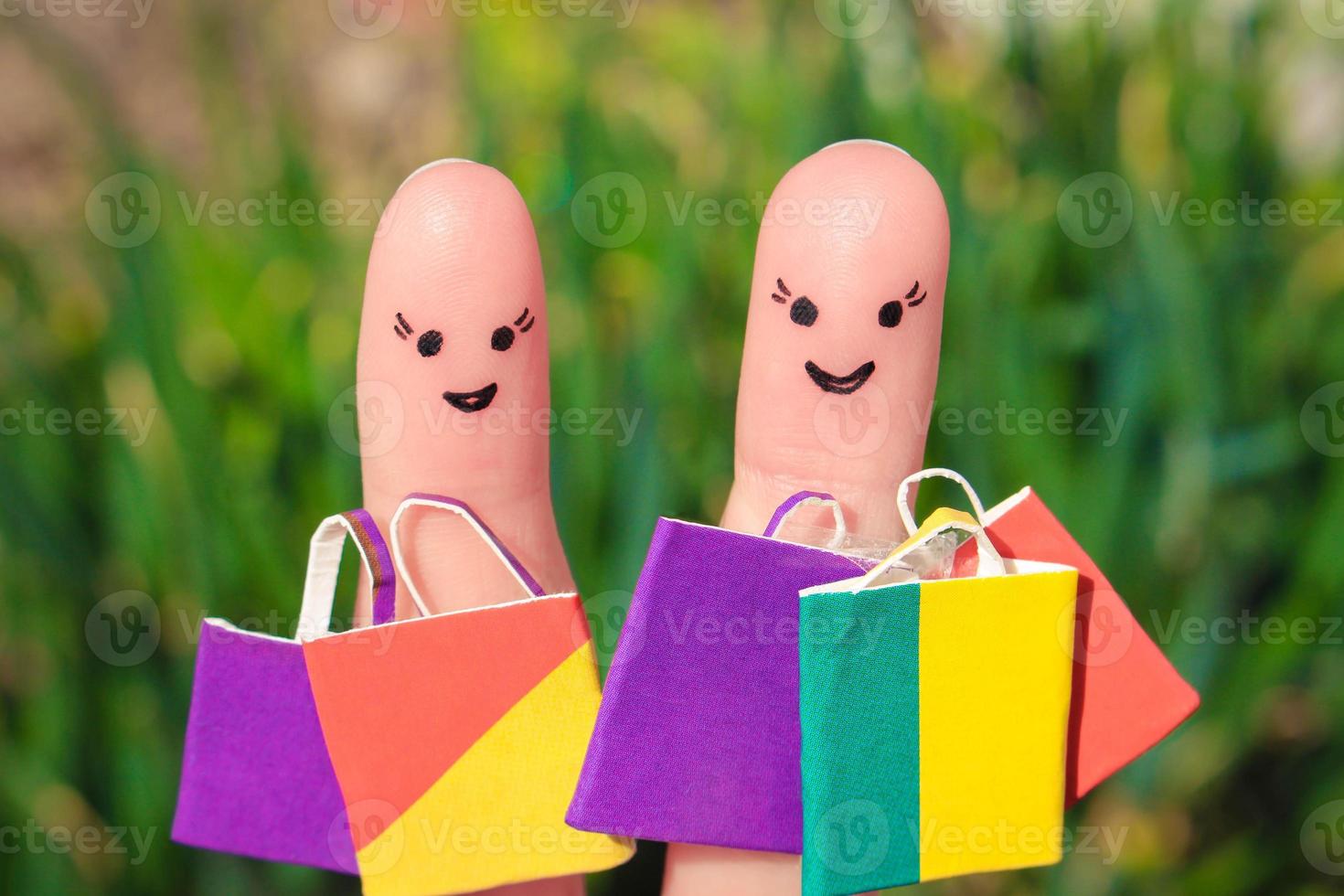 Finger art of a Happy friends with shopping bags photo