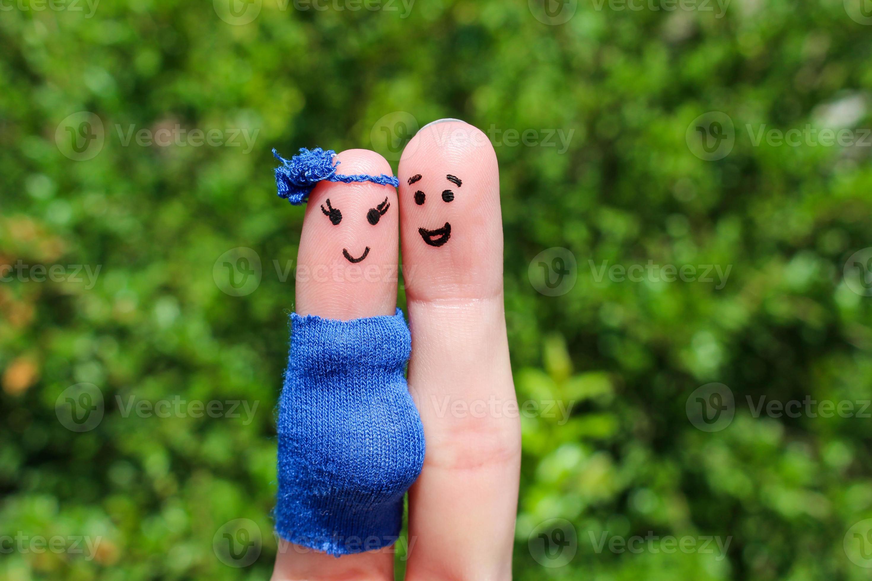 finger-art-of-a-happy-couple-woman-is-pregnant-23056536-stock-photo