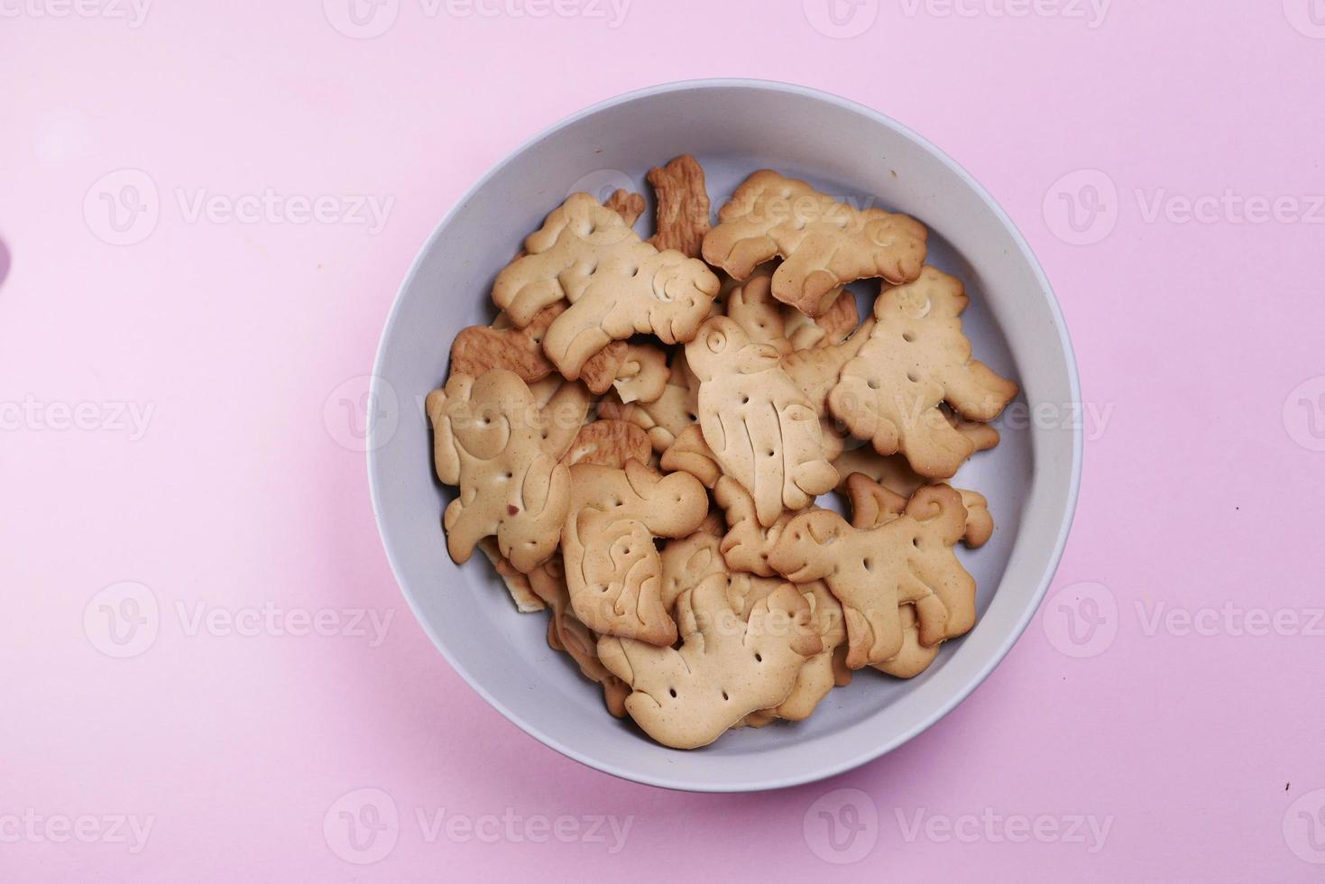 close up of sweet cookies on wooden table photo