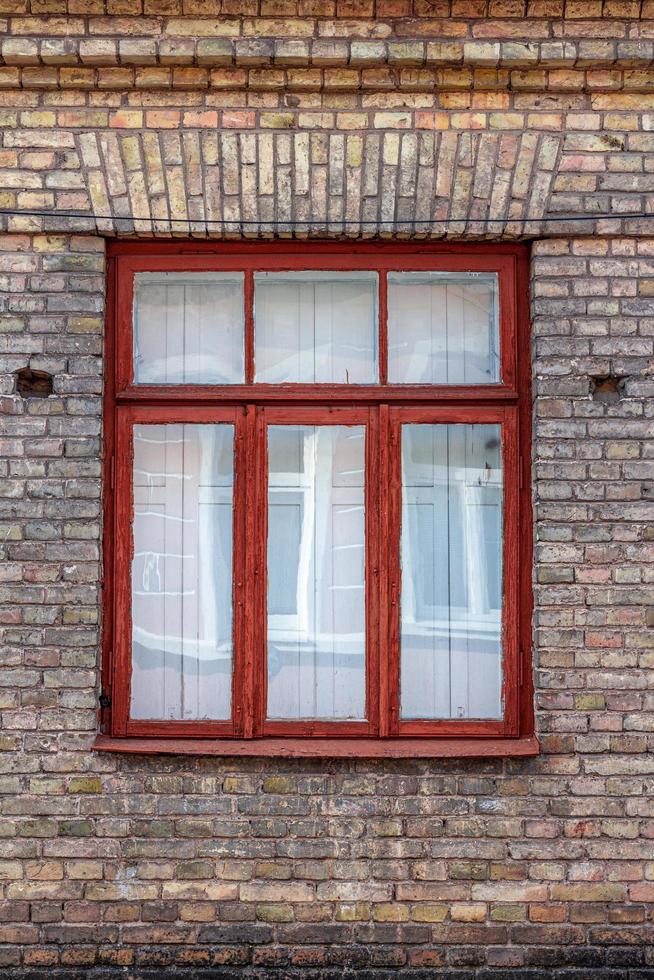 Old wooden window with shutters inside the house. photo