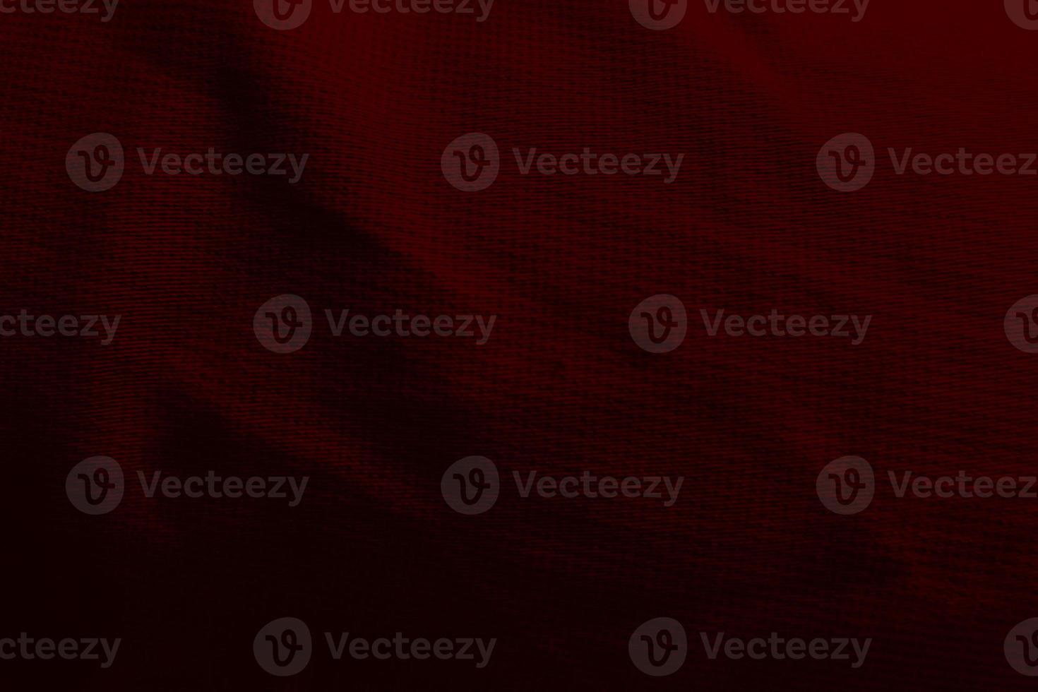 Fabric Red Grunge Textured Background for Bold, Eliciting Passion, Energy, Power, Strength, and Impactful Designs photo