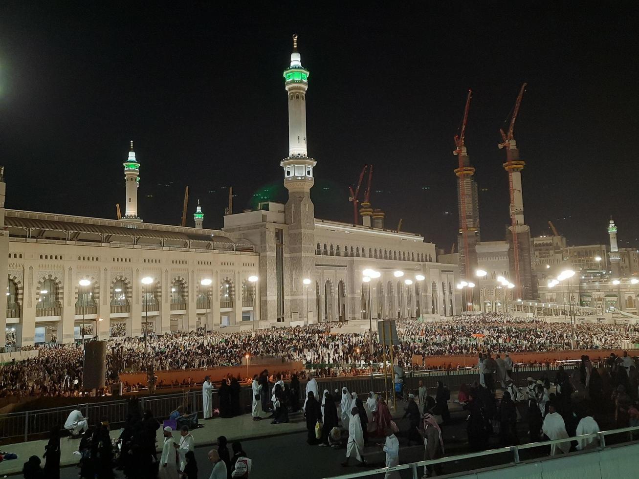 Mecca, Saudi Arabia, April 2023 - Pilgrims from all over the world gather around Masjid al-Haram on the twenty-ninth night of Ramadan in Makkah. photo