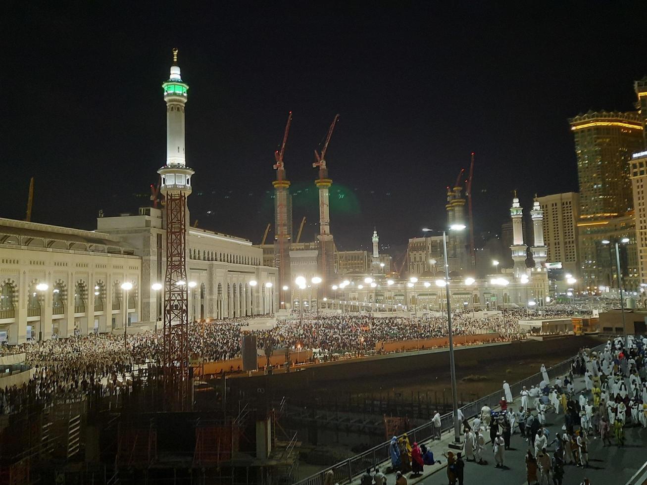 Mecca, Saudi Arabia, April 2023 - Pilgrims from all over the world gather around Masjid al-Haram on the twenty-ninth night of Ramadan in Makkah. photo