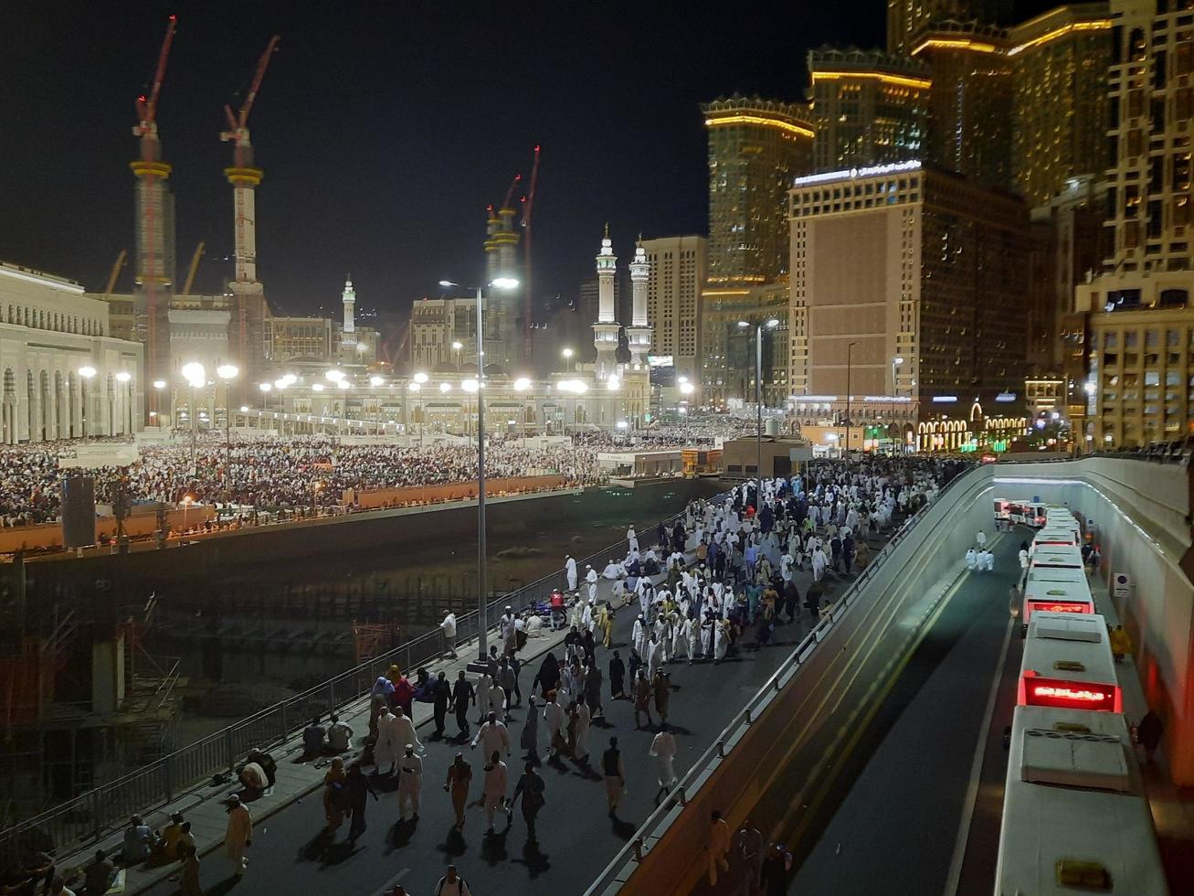 Mecca, Saudi Arabia, April 2023 - Pilgrims from all over the world gather around Masjid al-Haram on the twenty-ninth night of Ramadan in Makkah. photo