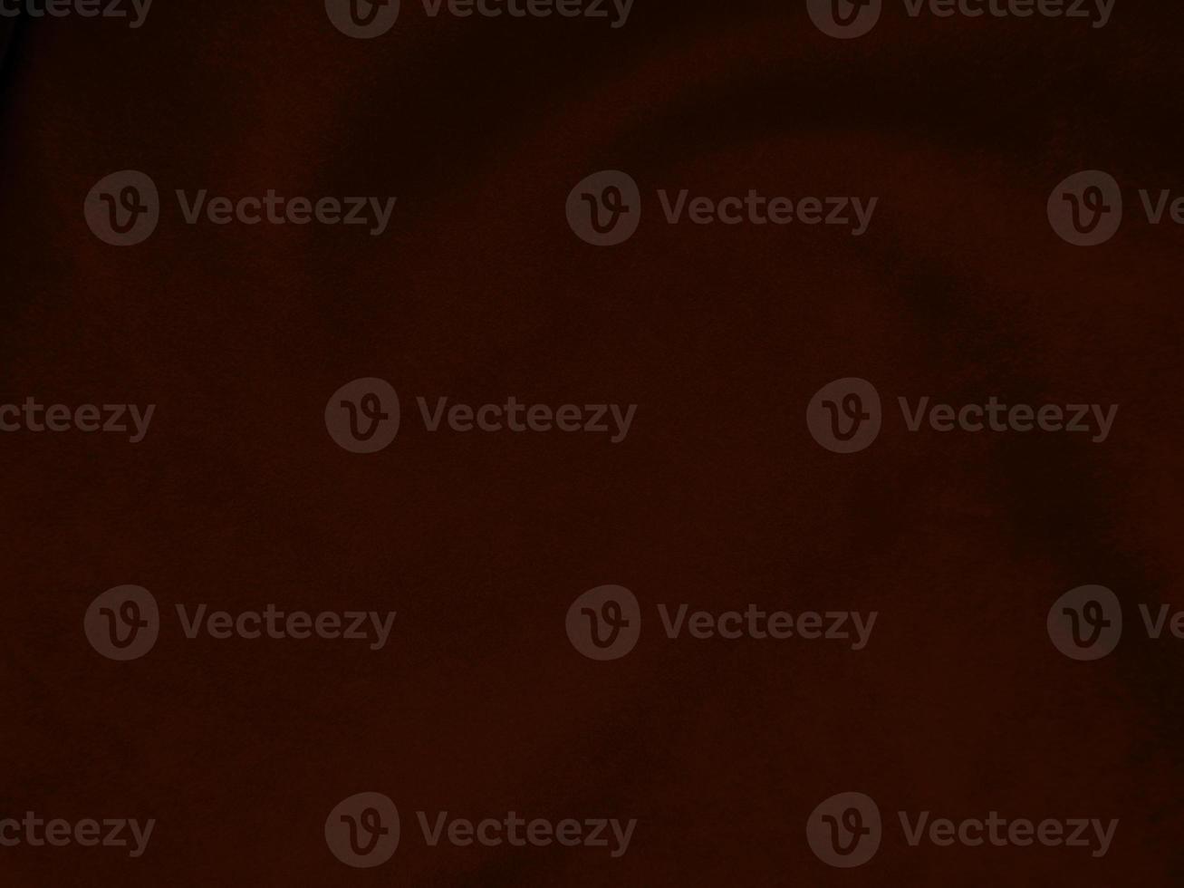 Dark red velvet fabric texture used as background. Empty dark red fabric background of soft and smooth textile material. There is space for text. photo