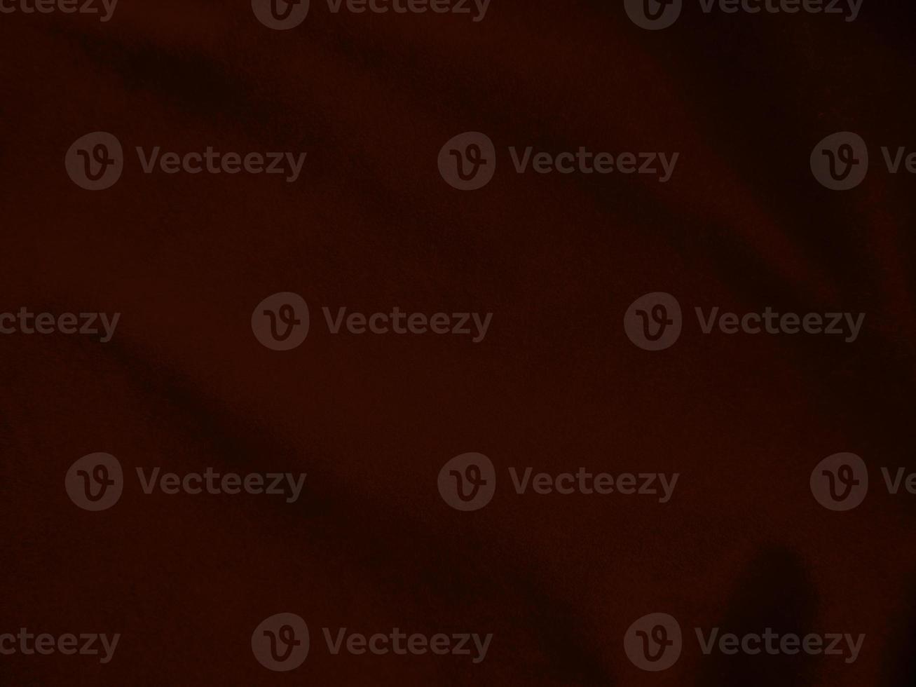 Dark red velvet fabric texture used as background. Empty dark red fabric background of soft and smooth textile material. There is space for text. photo