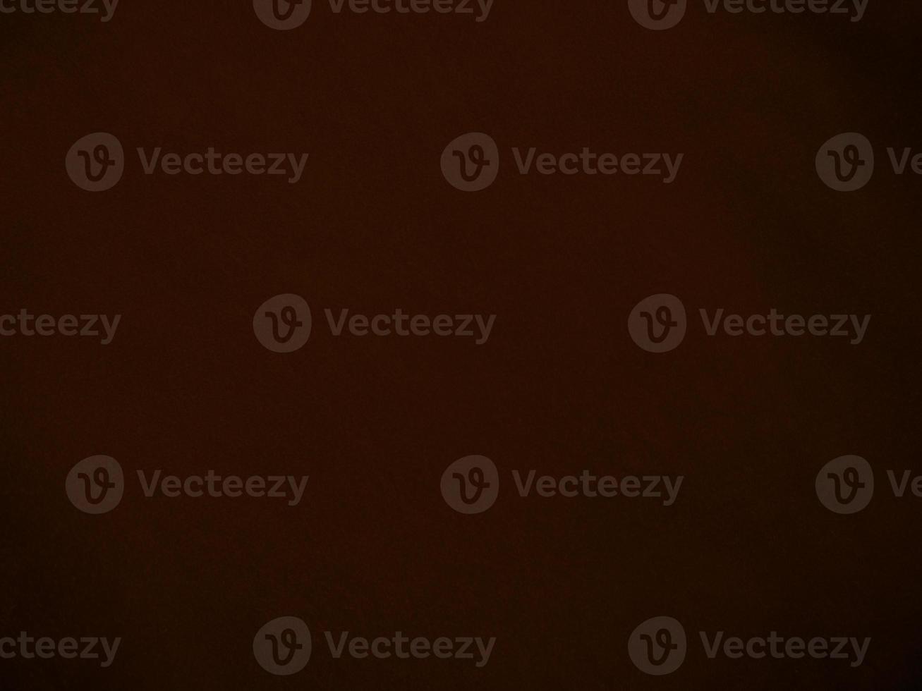 Dark red velvet fabric texture used as background. Empty dark red fabric background of soft and smooth textile material. There is space for text. photo