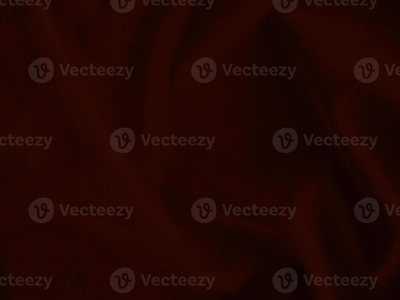 Dark red velvet fabric texture used as background. Empty dark red fabric background of soft and smooth textile material. There is space for text. photo