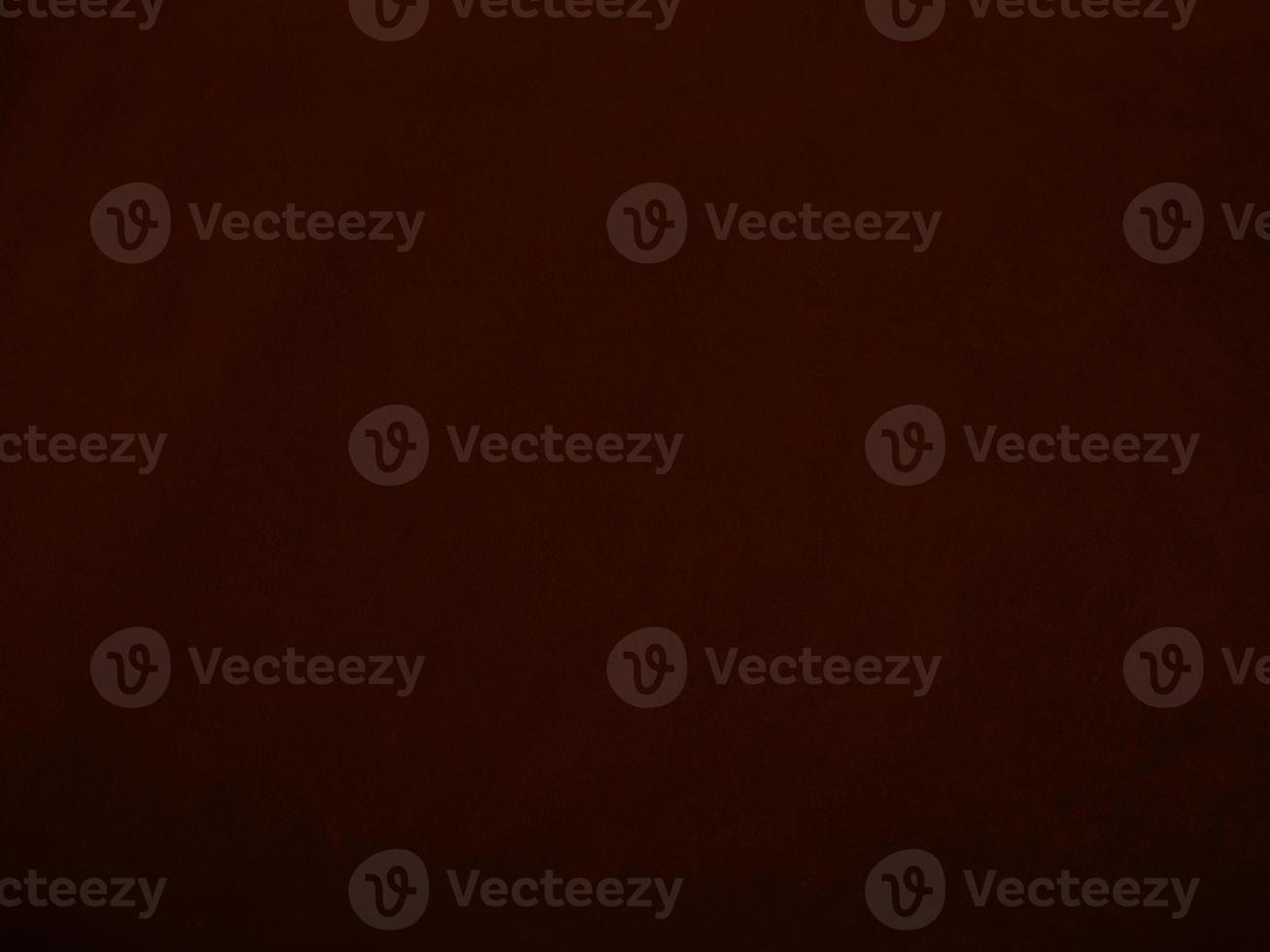 Dark red velvet fabric texture used as background. Empty dark red fabric background of soft and smooth textile material. There is space for text. photo