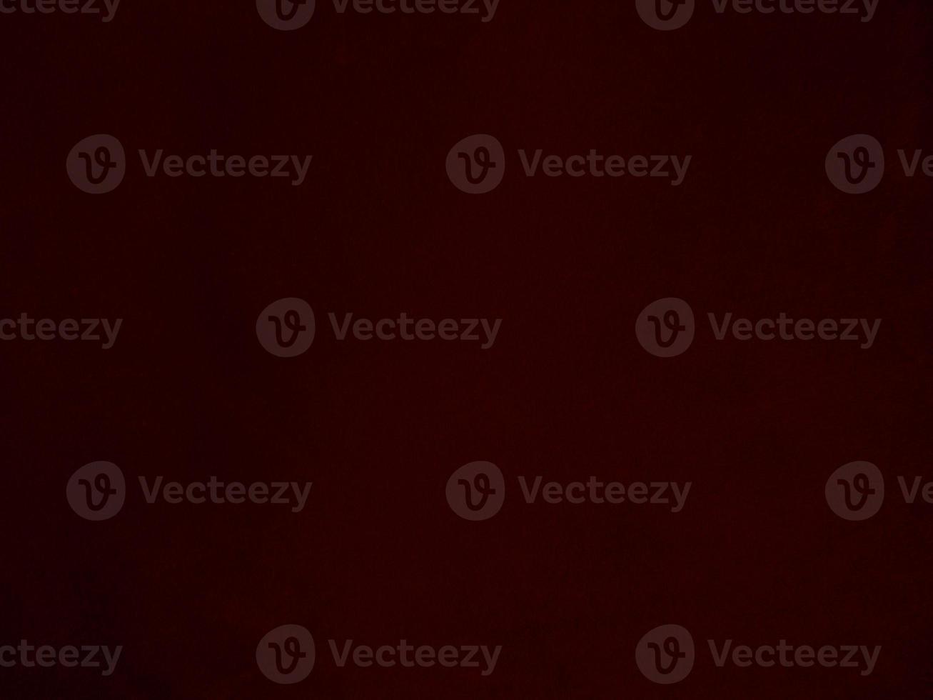 Dark red velvet fabric texture used as background. Empty dark red fabric background of soft and smooth textile material. There is space for text. photo