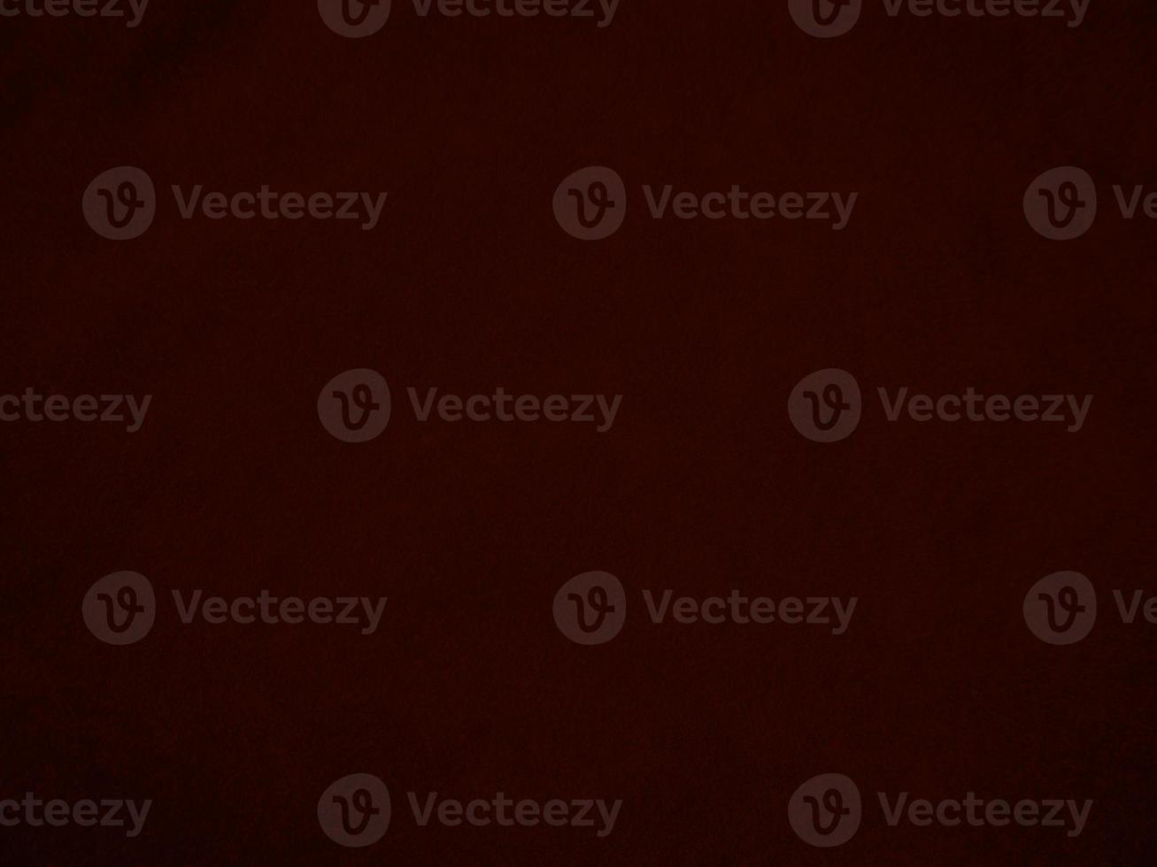 Dark red velvet fabric texture used as background. Empty dark red fabric background of soft and smooth textile material. There is space for text. photo