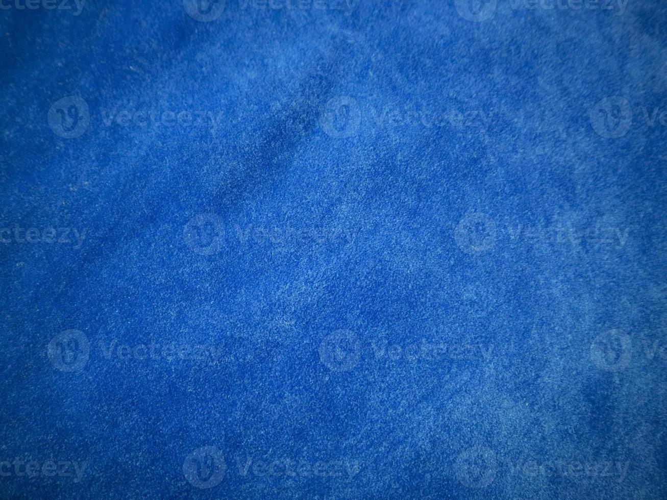 Blue velvet fabric texture used as background. Empty blue fabric background of soft and smooth textile material. There is space for text. photo