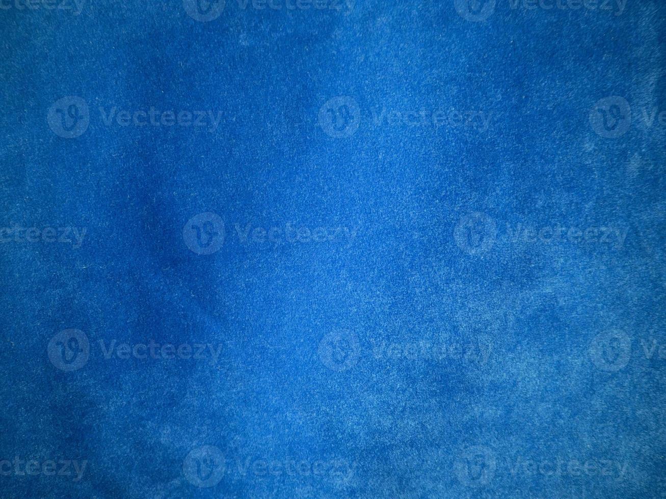 Blue velvet fabric texture used as background. Empty blue fabric background of soft and smooth textile material. There is space for text. photo